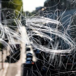 Window with engraved graffiti