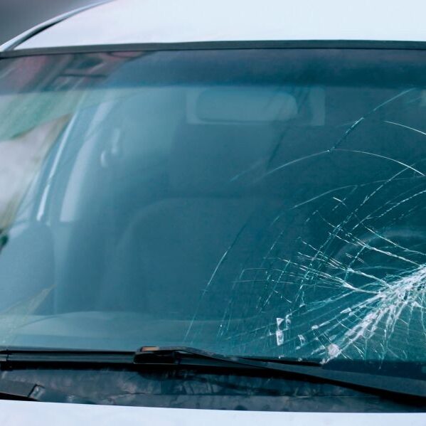 safety glazing film on windshield with glass broken on car.